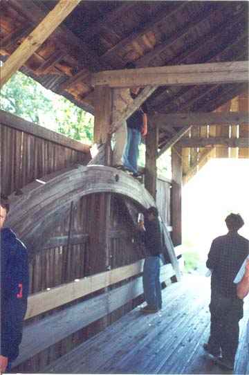 Students take measurements of each building member of the Lake Shore bridge