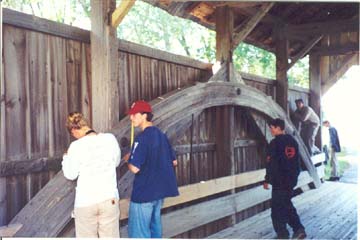 Students take measurements of each building member of the Lake Shore bridge