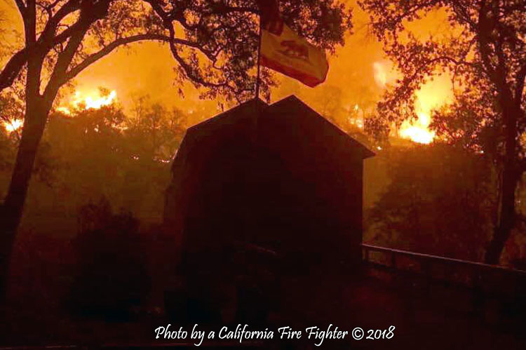 Honey Run Covered Bridge with approaching flames