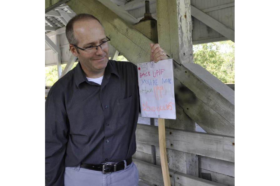 Justin Smith and Dela Stoddard-McGrath's sign